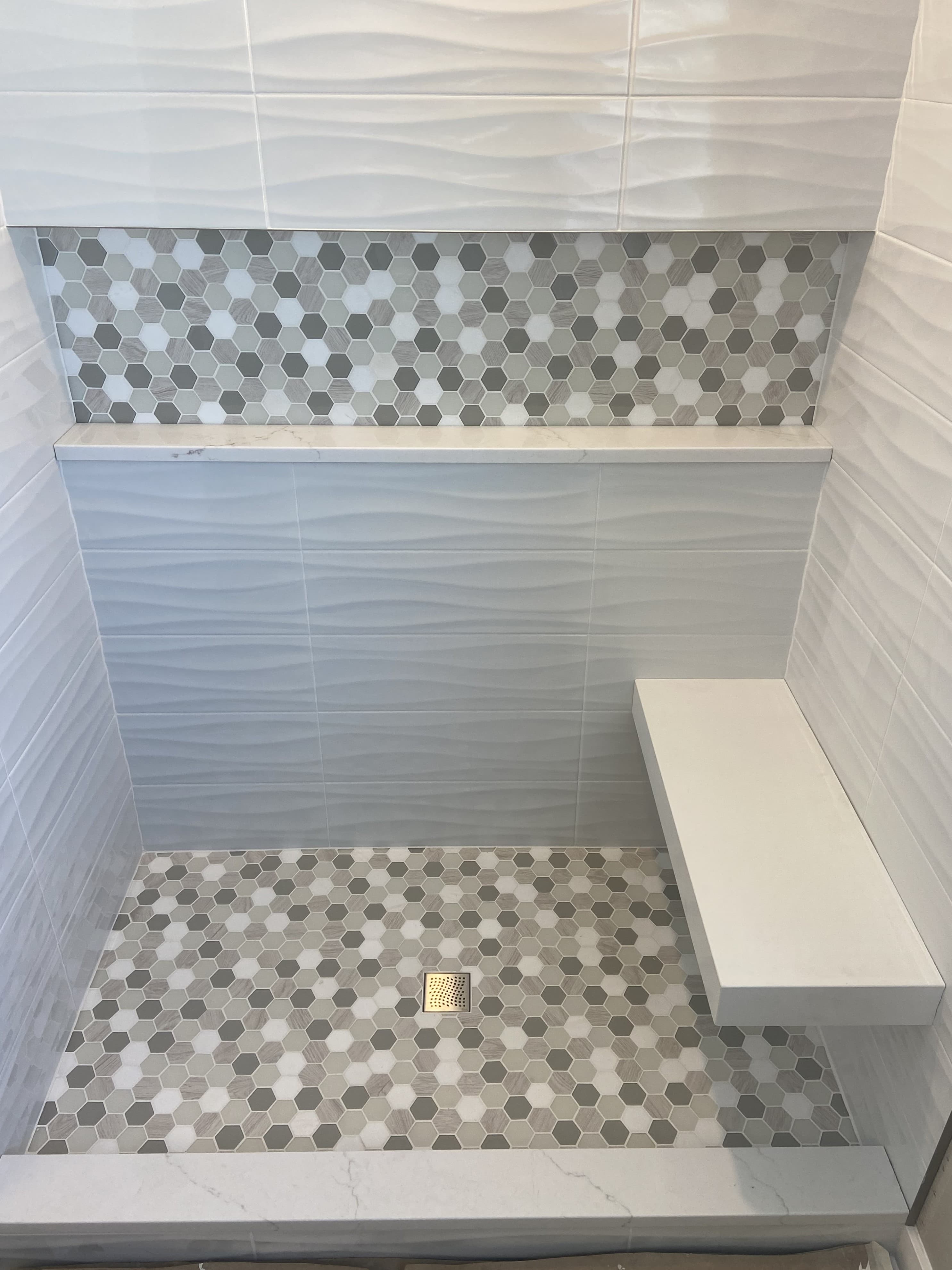 remodeled luxury bathroom tile with new custom tile floor and tile walls